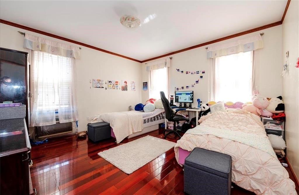 1722 Ave V Brooklyn, NY 11229 - Photo 9 of 28 a living room with furniture and wooden floor
