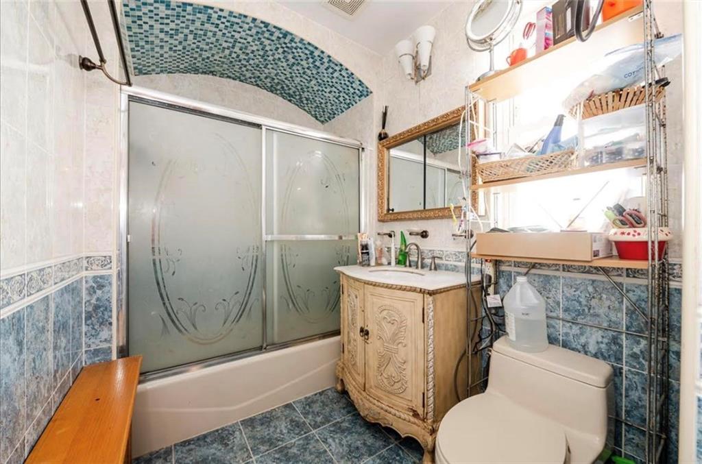 1722 Ave V Brooklyn, NY 11229 - Photo 10 of 28 a bathroom with a sink toilet and shower