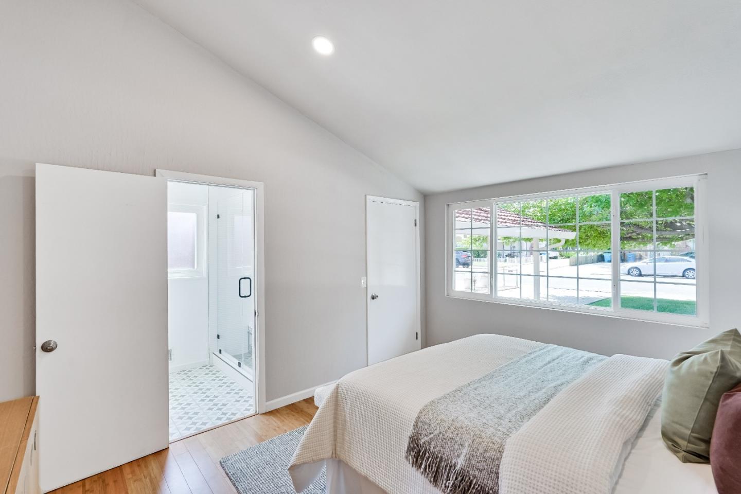 1755 Ravizza Avenue Santa Clara, CA 95051 - Photo 28 of 36 a bedroom with a bed and a window