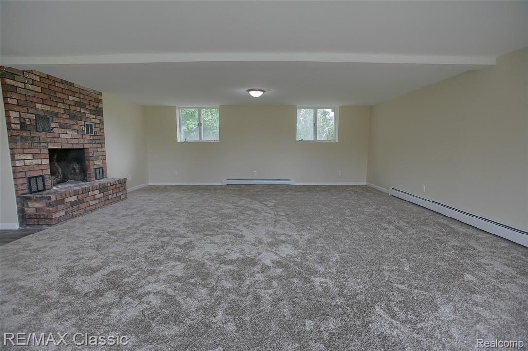 8661 Antcliff Road Howell, MI 48855 - Photo 19 of 38 Finished_Lower_Level.jpg