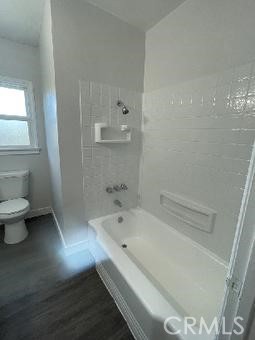 3900 5th Street, Unit 23 Riverside, CA 92501 - Photo 14 of 26 a bathroom with a bathtub and a toilet