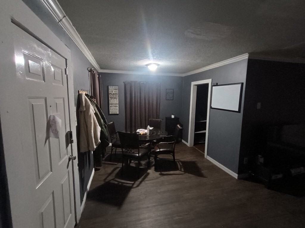 11914 Anchick Street Houston, TX 77076 - Photo 9 of 13 a view of a hallway with seating area