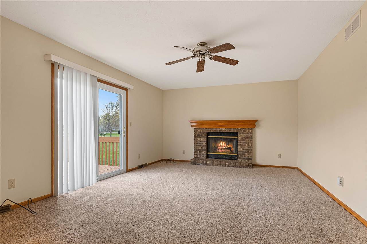504 Pin Oak Road Rockton, IL 61072 - Photo 8 of 23 a view of an empty room with a window