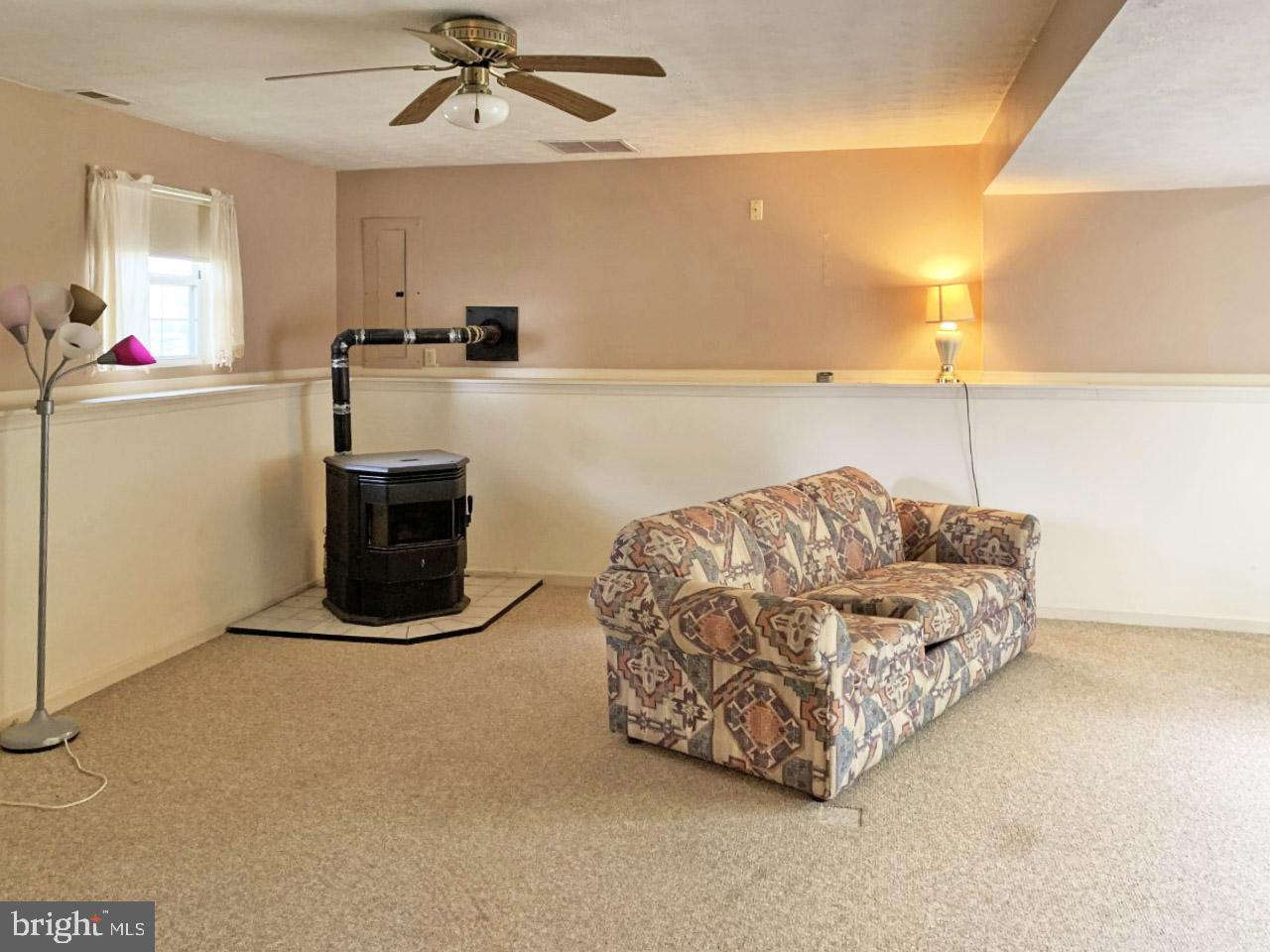 3846 Dakota Road Hampstead, MD 21074 - Photo 15 of 20 Family Room has a pellet stove.
