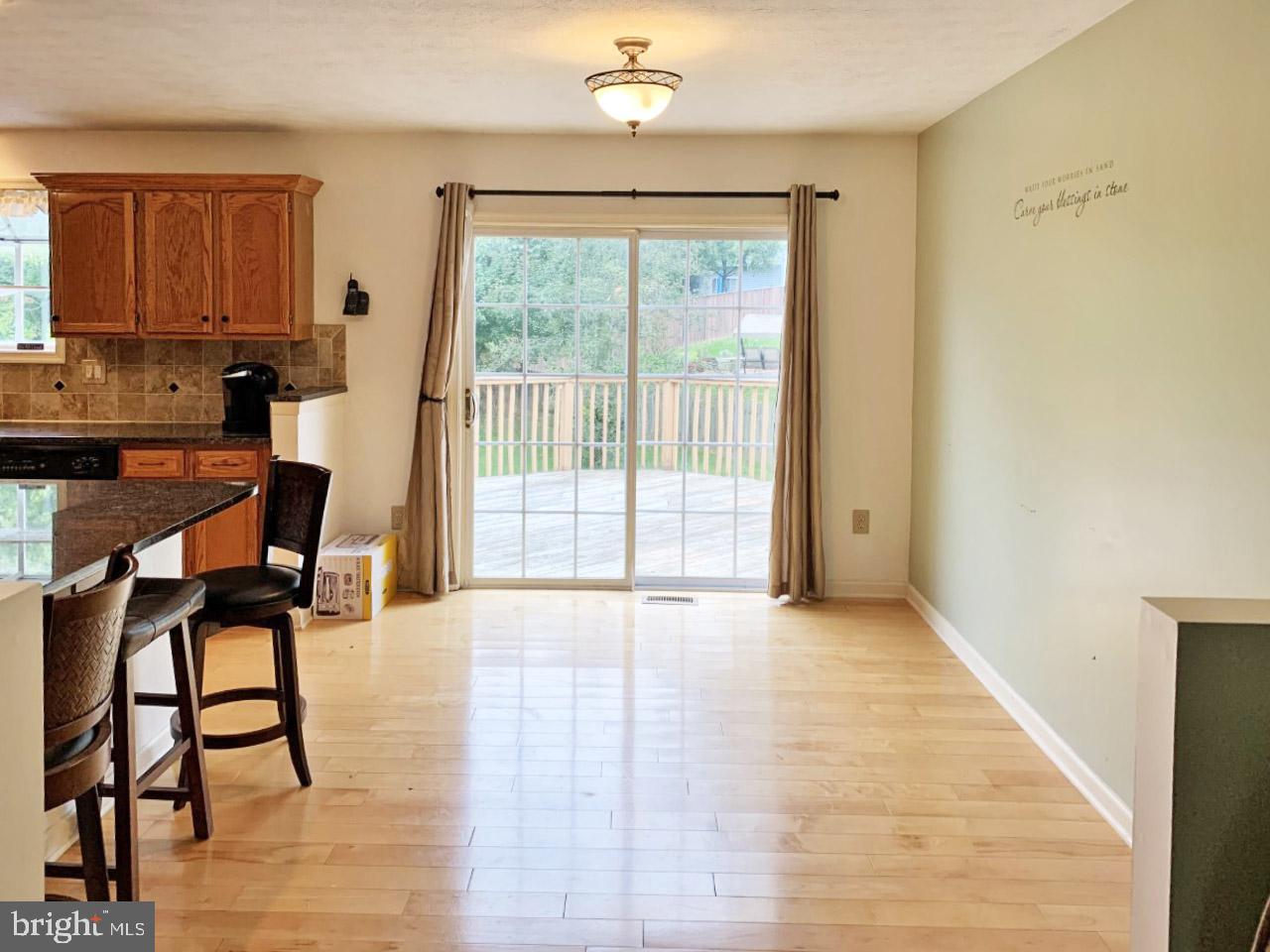 3846 Dakota Road Hampstead, MD 21074 - Photo 9 of 20 Dining area and kitchen have Maple Hardwood Floors
