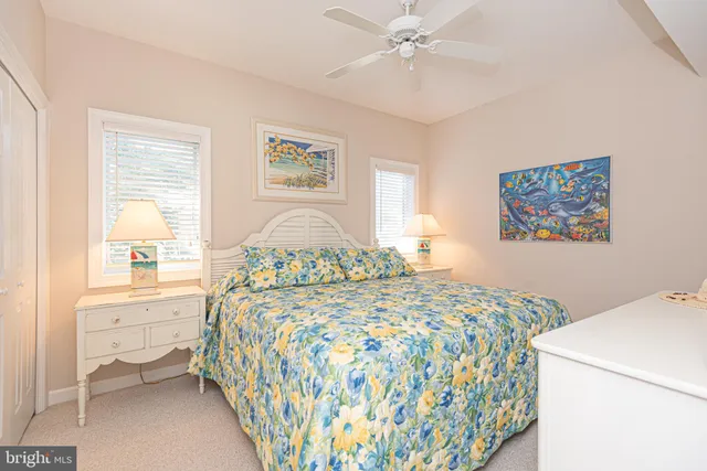 a picture of a bench in front of a wall