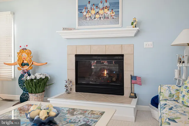 a kitchen with stainless steel appliances granite countertop a sink a stove and refrigerator
