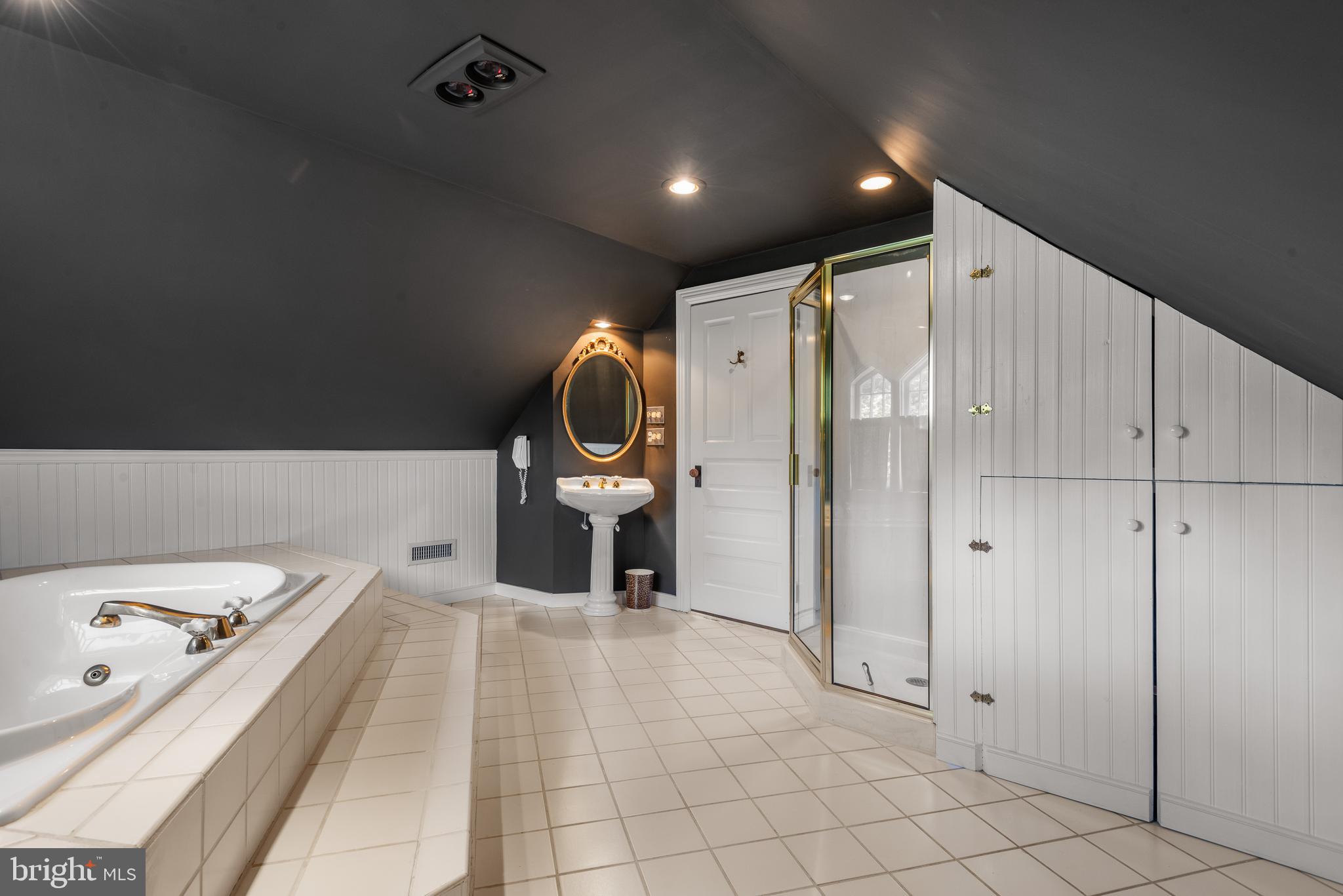312 South Waterloo Road Devon, PA 19333 - Photo 47 of 70 a spacious bathroom with a bathtub and a toilet