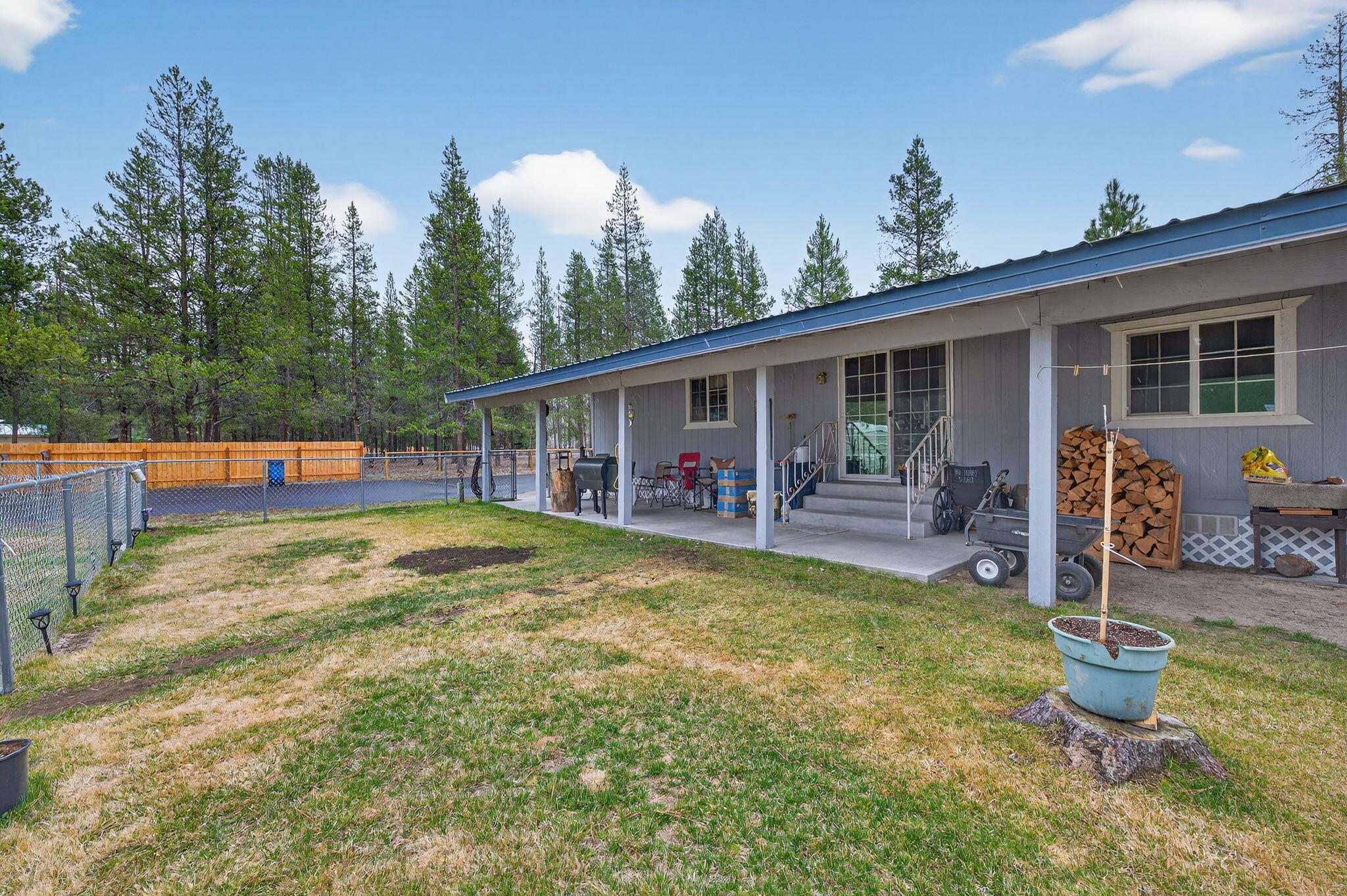 16274 Dyke Road La Pine, OR 97739 - Photo 14 of 20 a view of a swimming pool with furniture