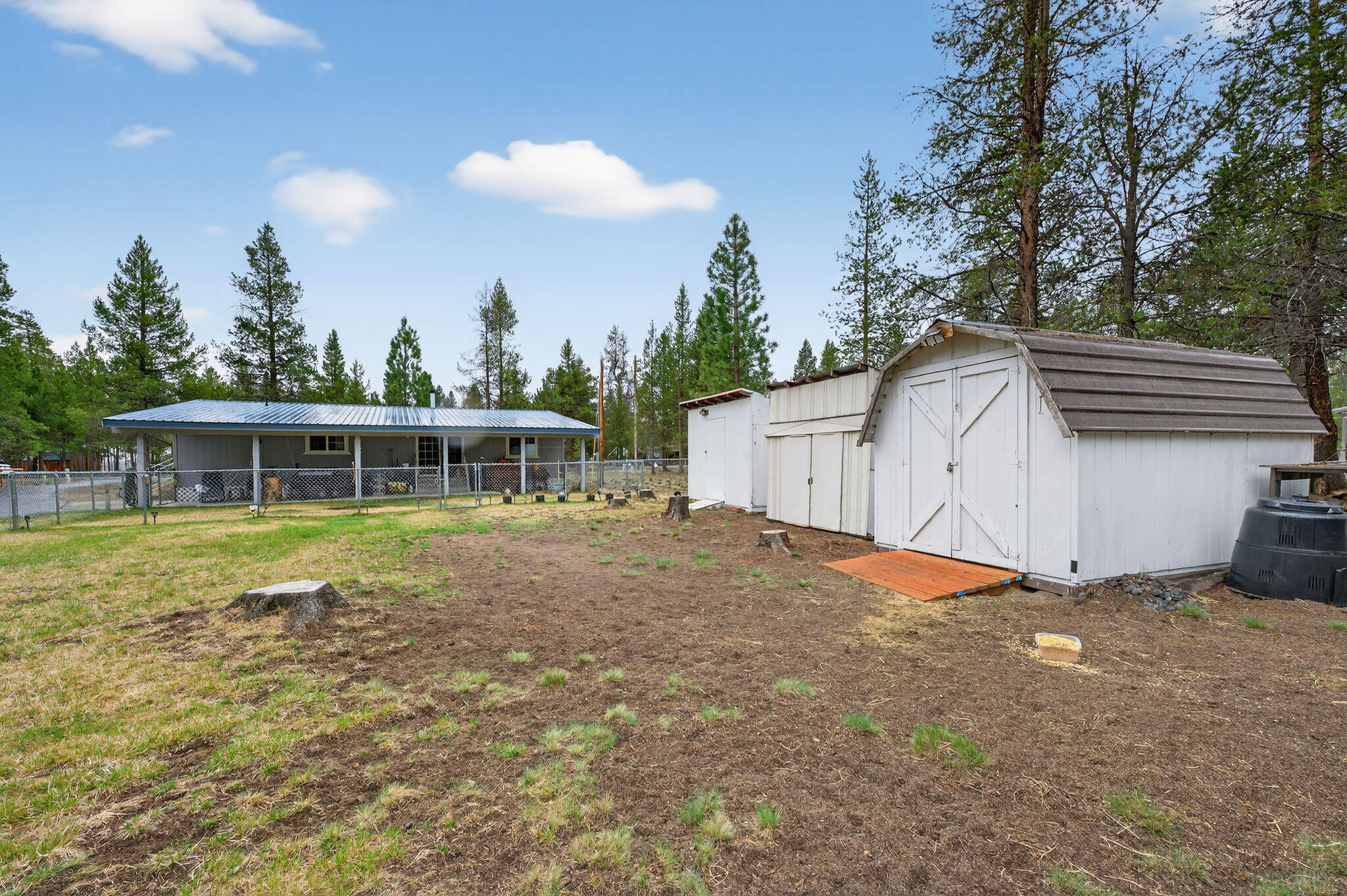 16274 Dyke Road La Pine, OR 97739 - Photo 17 of 20 a view of a house with a backyard and balcony