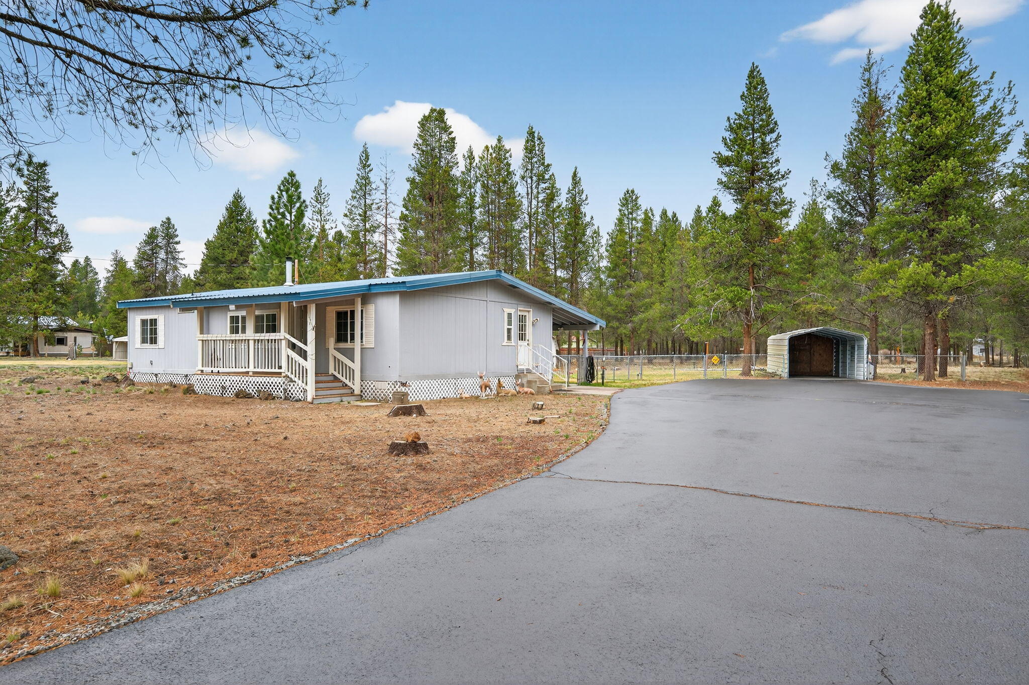 16274 Dyke Road La Pine, OR 97739 - Photo 19 of 20 a view of a house with a patio