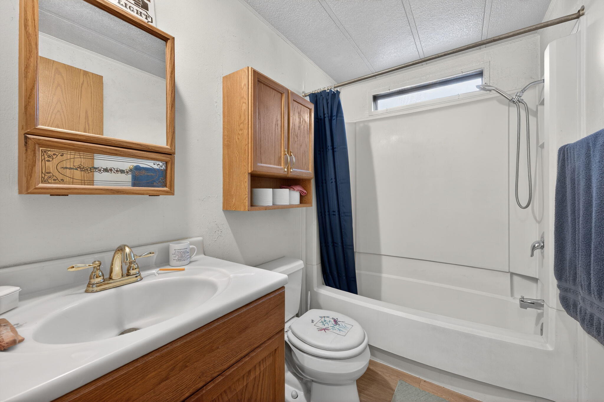 16274 Dyke Road La Pine, OR 97739 - Photo 10 of 20 a bathroom with a sink toilet and shower
