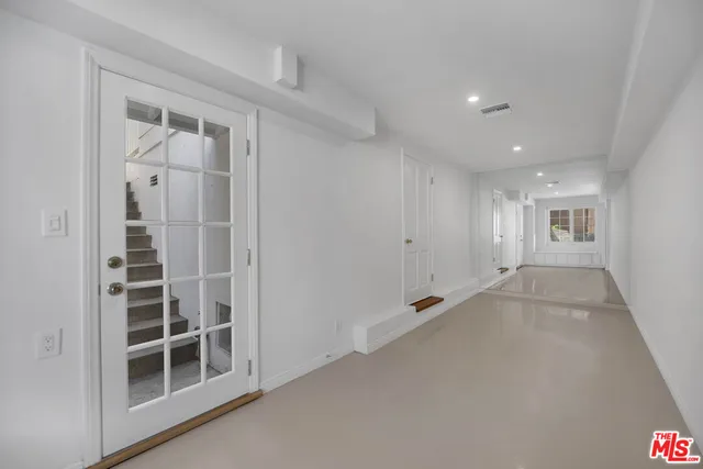 a view of livingroom with washer and dryer