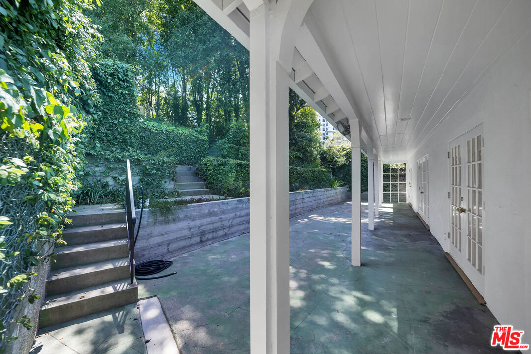 1231 Club View Drive Los Angeles, CA 90024 - Photo 18 of 19 a view of backyard with green space