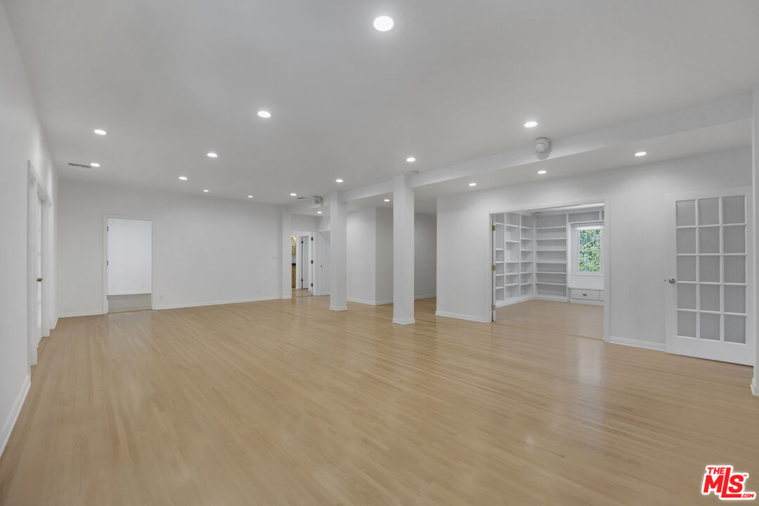 1231 Club View Drive Los Angeles, CA 90024 - Photo 2 of 19 a view of an empty room with wooden floor