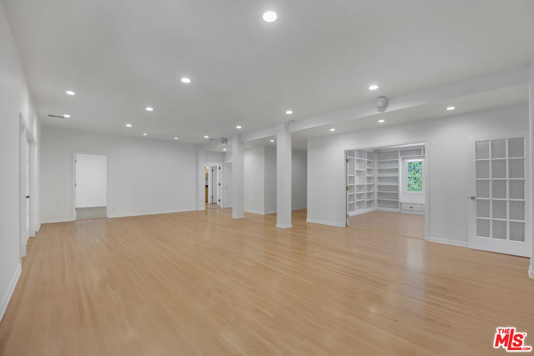 1231 Club View Drive Los Angeles, CA 90024 - Photo 3 of 19 a view of an empty room with wooden floor