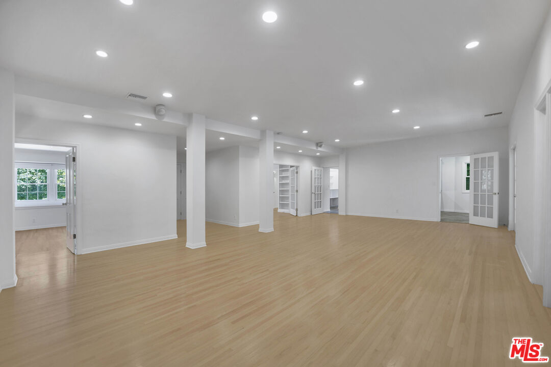1231 Club View Drive Los Angeles, CA 90024 - Photo 4 of 19 a view of an empty room with wooden floor