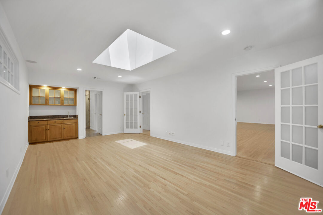 1231 Club View Drive Los Angeles, CA 90024 - Photo 5 of 19 a view of a kitchen with a sink and a refrigerator
