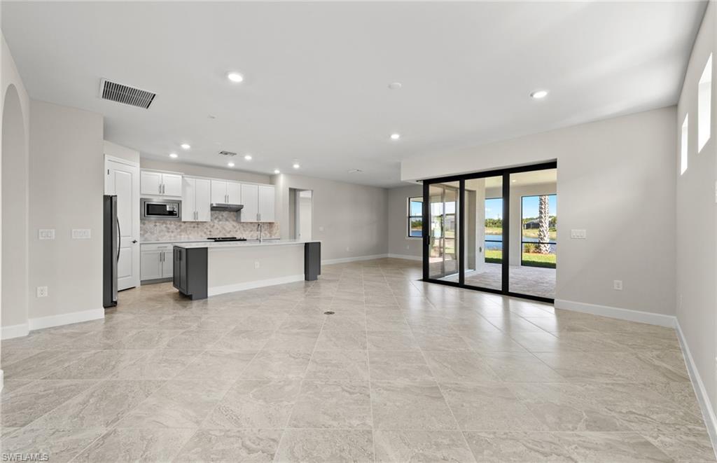 17039 Oakstead Drive Alva, FL 33920 - Photo 17 of 49 a view of an empty room with a window