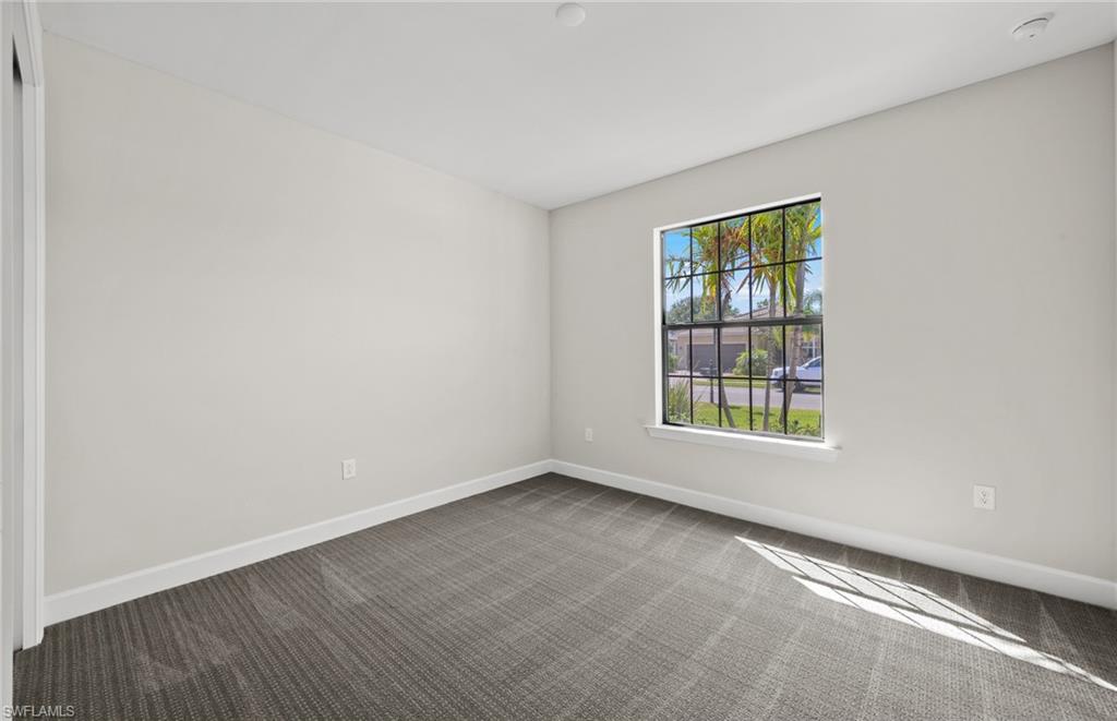 17039 Oakstead Drive Alva, FL 33920 - Photo 27 of 49 an empty room with a window