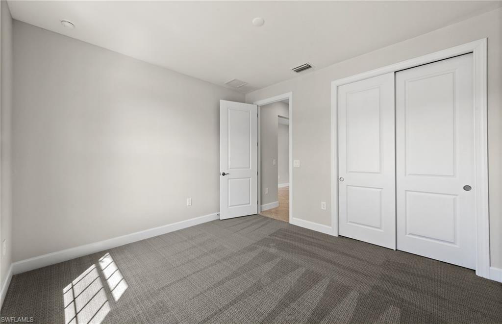 17039 Oakstead Drive Alva, FL 33920 - Photo 28 of 49 a view of an empty room