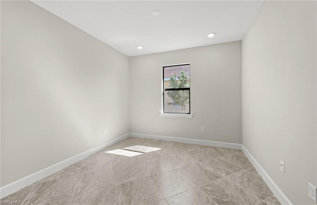 17039 Oakstead Drive Alva, FL 33920 - Photo 30 of 49 an empty room with a window