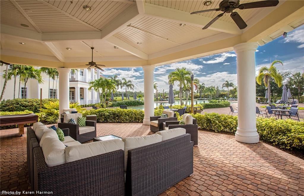 17039 Oakstead Drive Alva, FL 33920 - Photo 43 of 49 a living room with patio furniture and garden