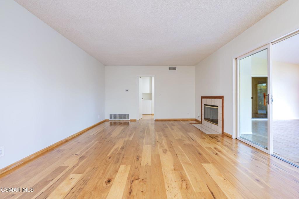 2085 Rayshire Street Thousand Oaks, CA 91362 - Photo 12 of 49 a view of empty room with wooden floor