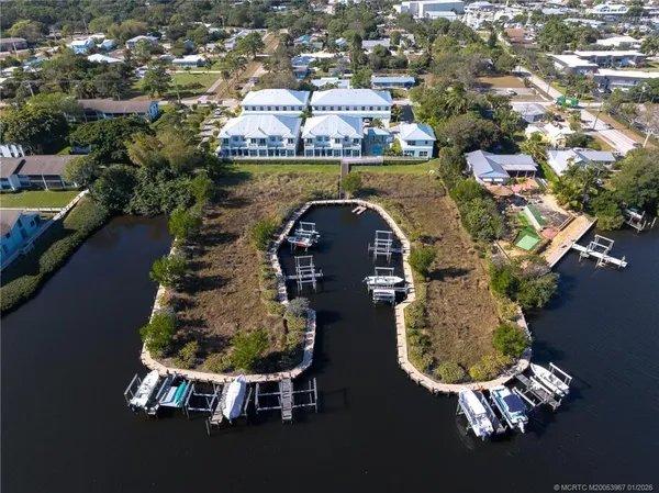 an aerial view of a house with outdoor space