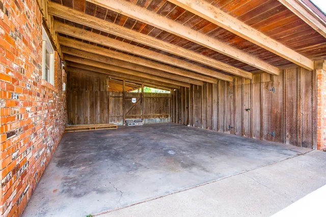 a view of an empty room with stairs