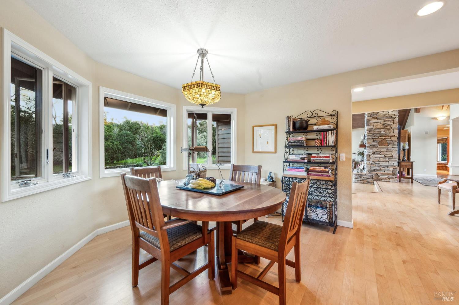 2220 Grove Street Sonoma, CA 95476 - Photo 12 of 25 a view of a dining room with furniture and a window