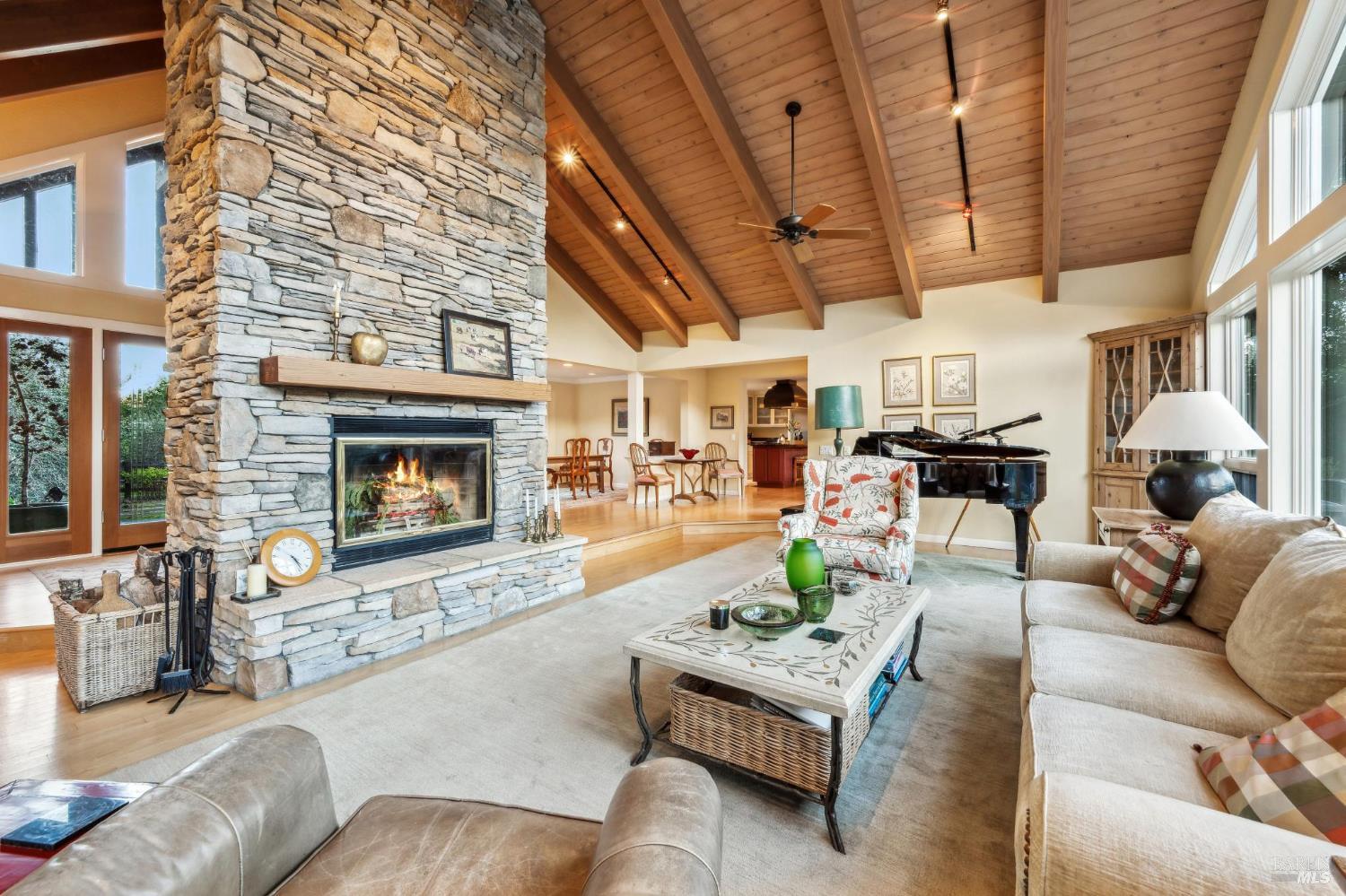 2220 Grove Street Sonoma, CA 95476 - Photo 8 of 25 a living room with furniture and a fireplace