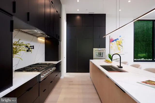 a spacious bedroom with a bed and glass window