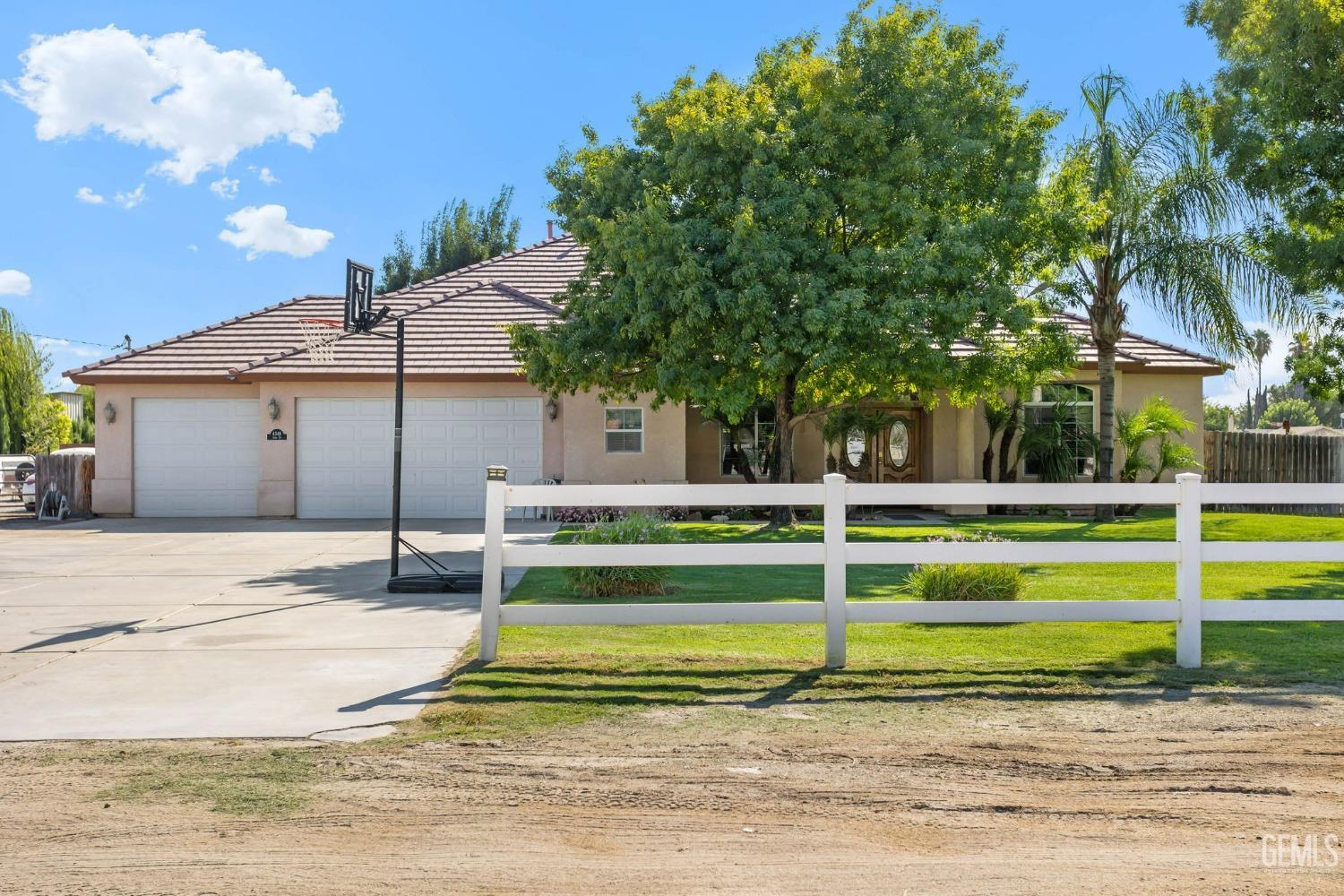 Undisclosed Address Bakersfield, CA 93314 - Photo 1 of 36 a view of a house with a big yard