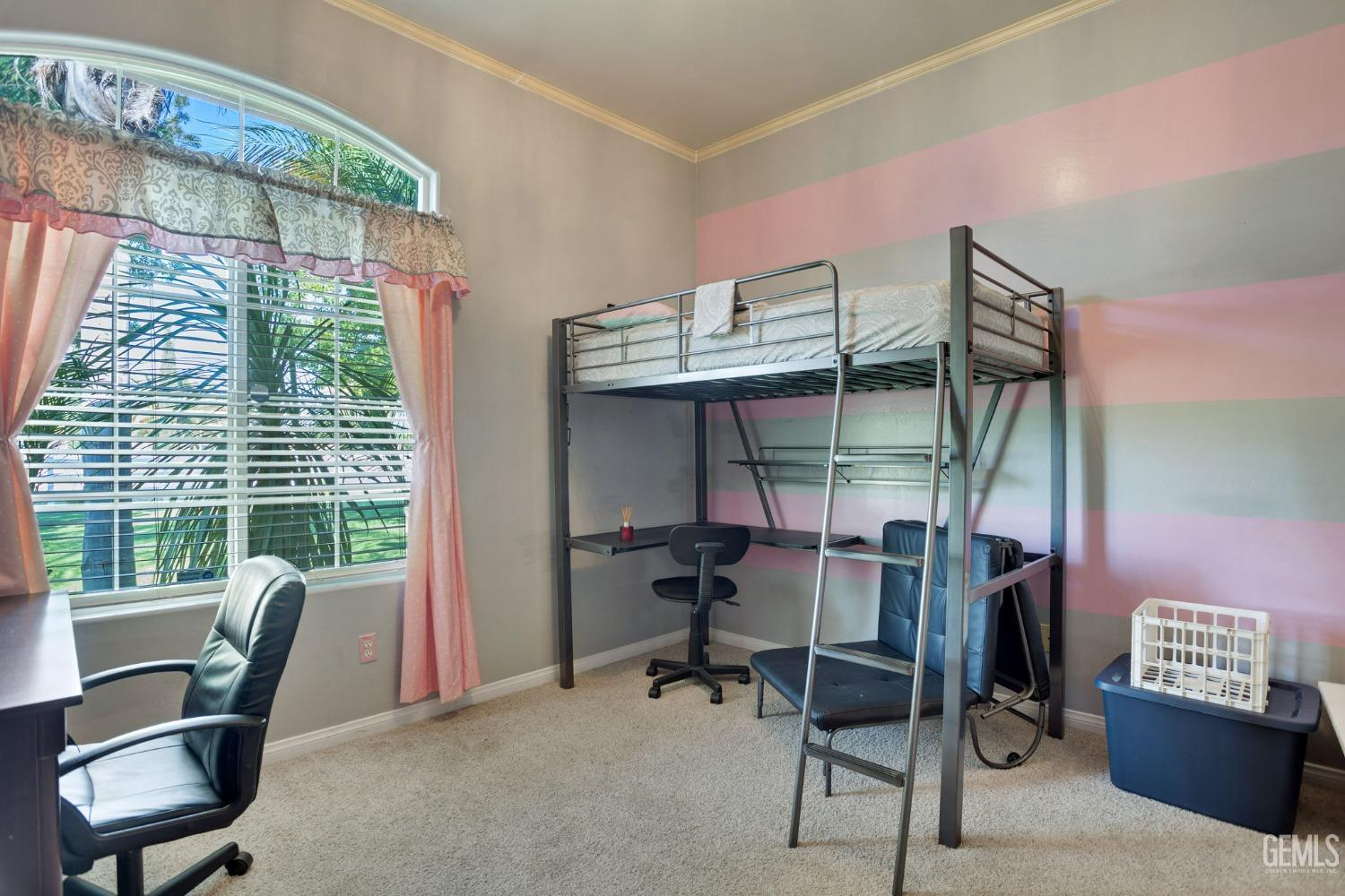 Undisclosed Address Bakersfield, CA 93314 - Photo 19 of 36 a view of a workspace with furniture and a window