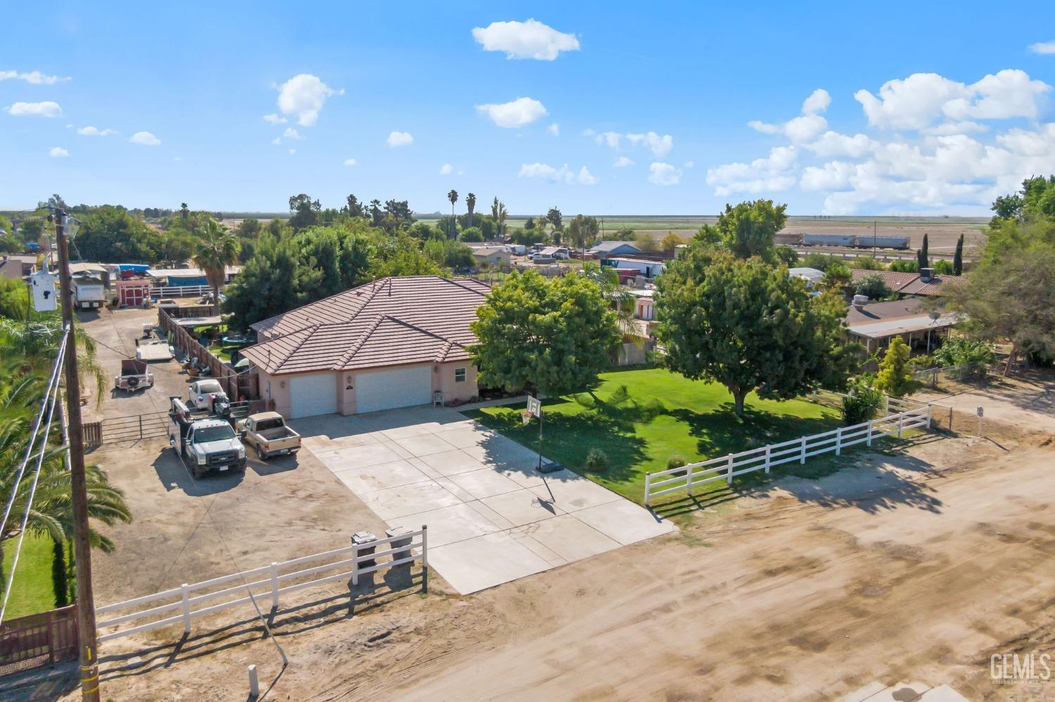 Undisclosed Address Bakersfield, CA 93314 - Photo 3 of 36 a view of a backyard