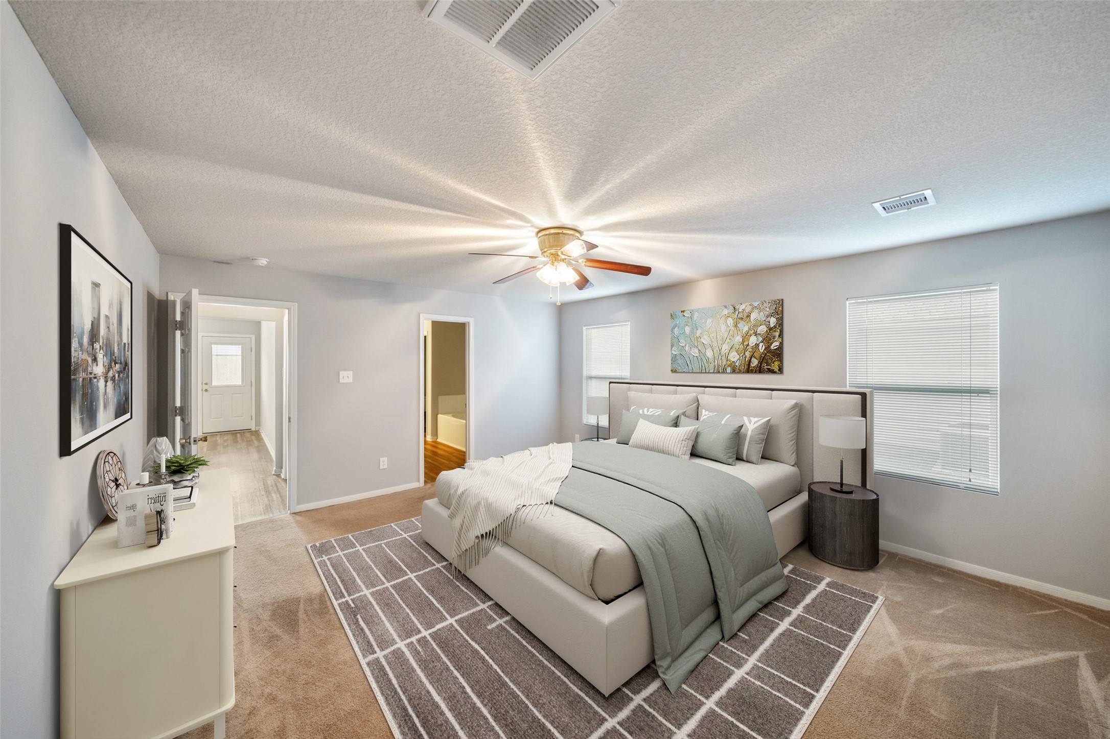 16820 Infield Court Conroe, TX 77385 - Photo 22 of 44 Spacious primary suite offers a peaceful retreat with room for a sitting area, abundant natural light, and a relaxing atmosphere at the end of the day. VIRTUALLY STAGE PRIMARY SUITE