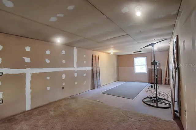 a view of a hallway with entryway