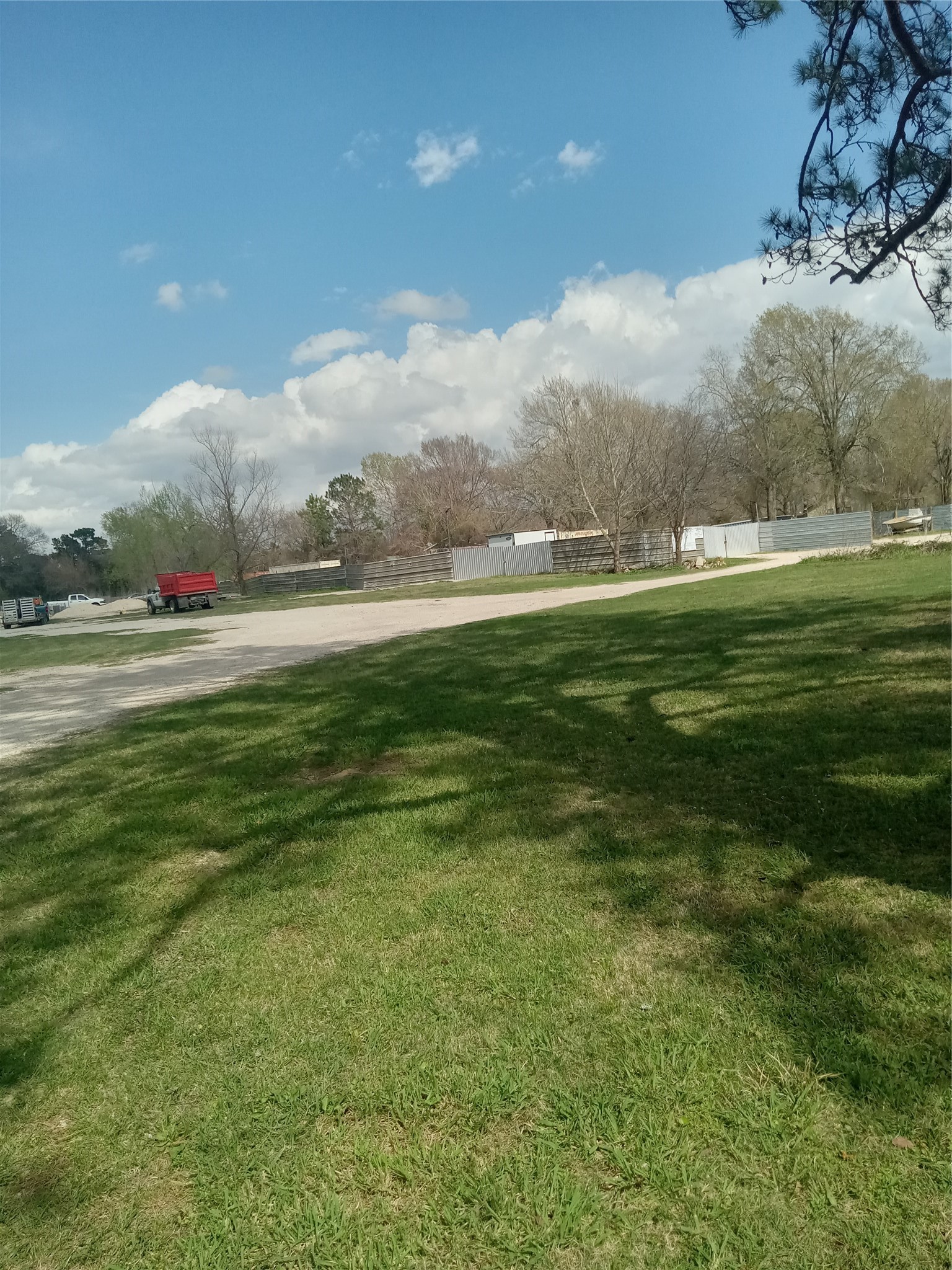 0 Goodson Road Magnolia, TX 77355 - Photo 3 of 9 a view of a green field