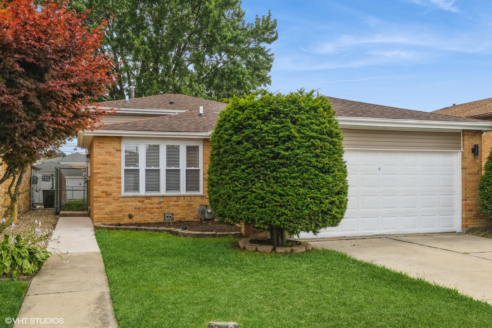 1119 Harding Avenue Calumet City, IL 60409 - Photo 1 of 11 front view of a house with a yard