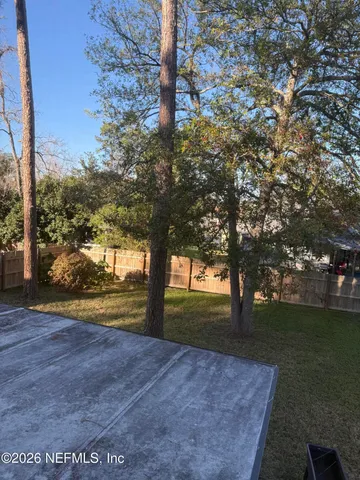 a view of swimming pool from a patio