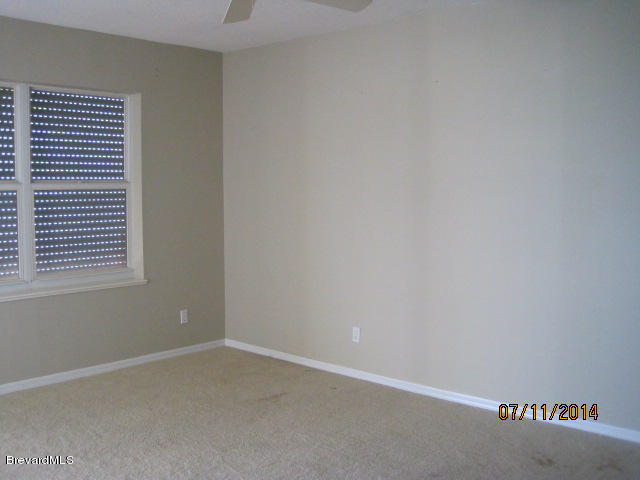 100 Riverside Drive, Unit 404 Cocoa, FL 32922 - Photo 3 of 9 Master Bedroom