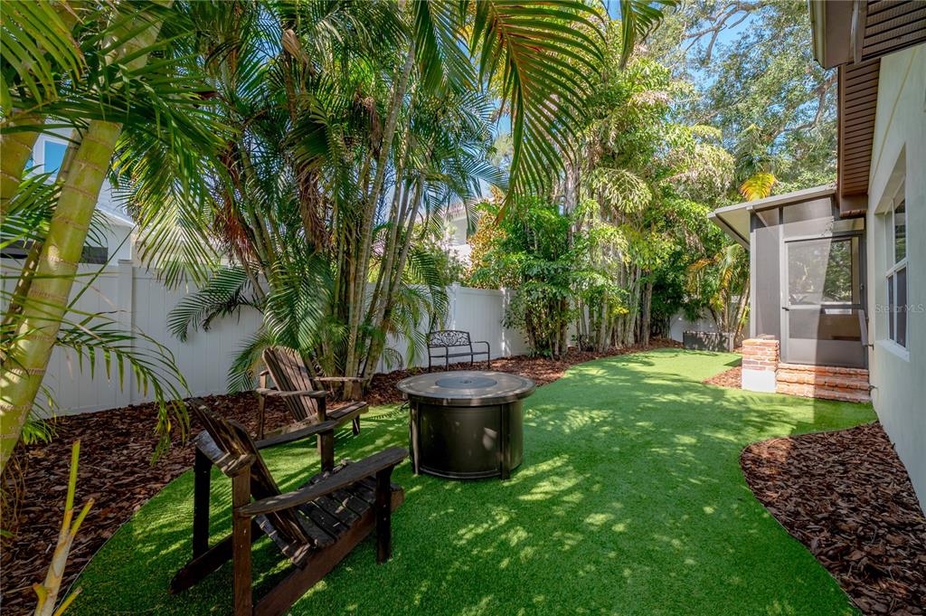 3108 West Villa Rosa Street Tampa, FL 33611 - Photo 50 of 58 a view of a garden with plants and large trees