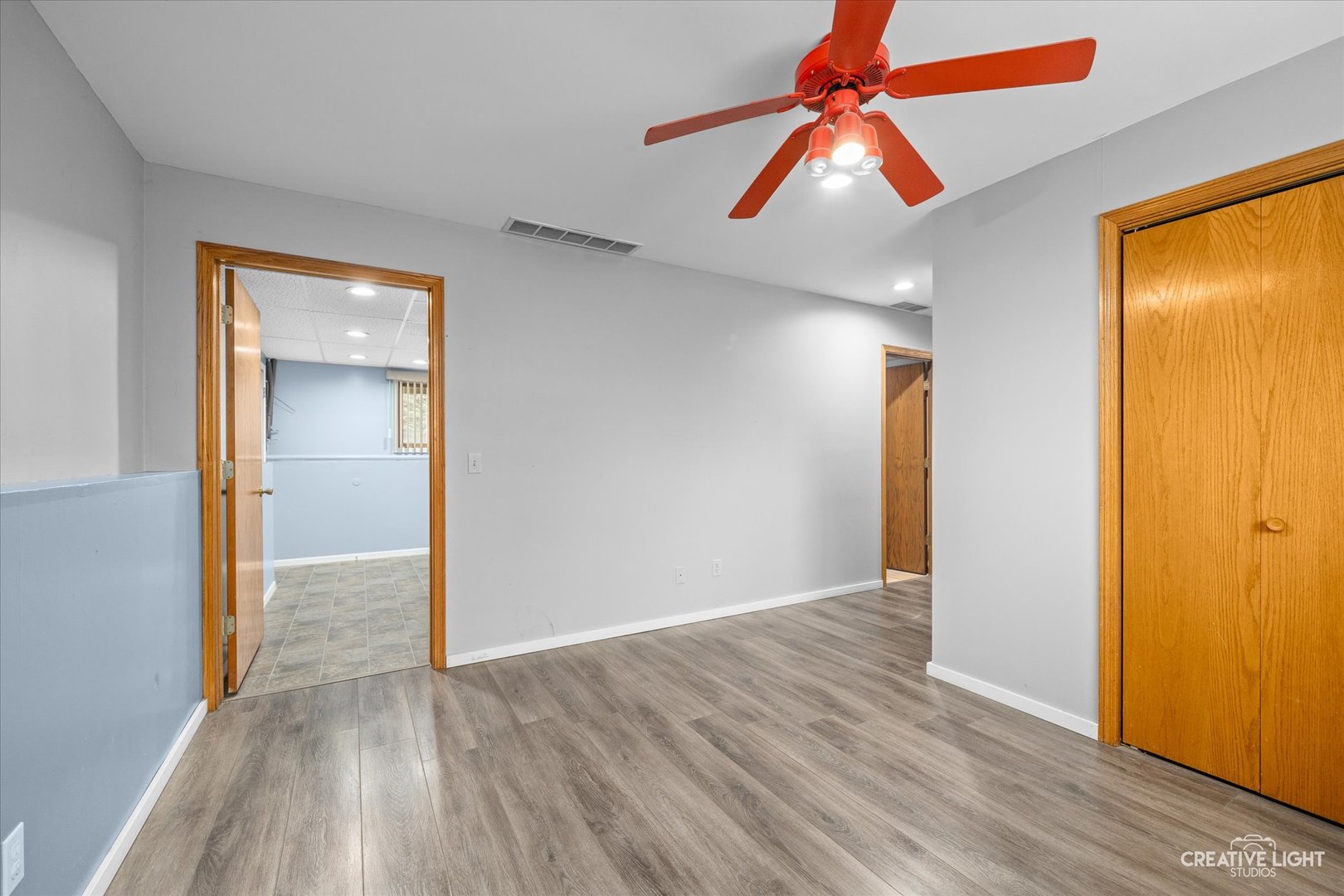 110 Windward Lane Rochelle, IL 61068 - Photo 14 of 23 a view of room with window and wooden floor