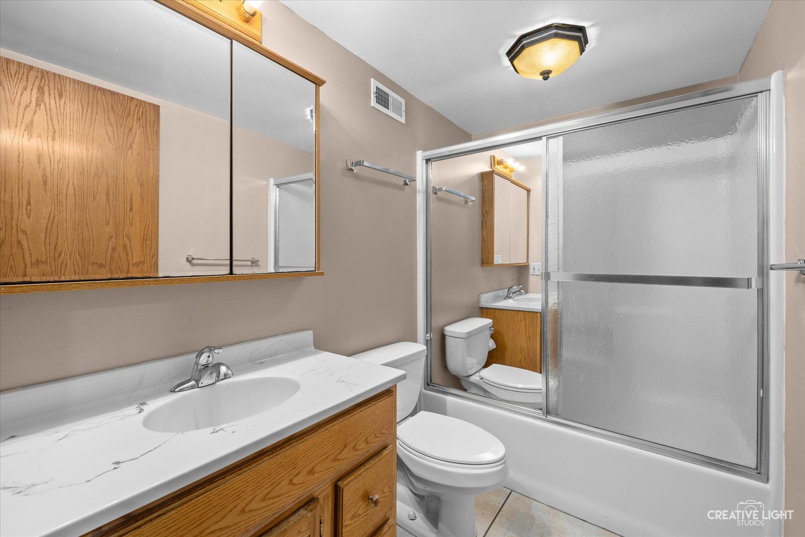 110 Windward Lane Rochelle, IL 61068 - Photo 16 of 23 a bathroom with a sink and a mirror