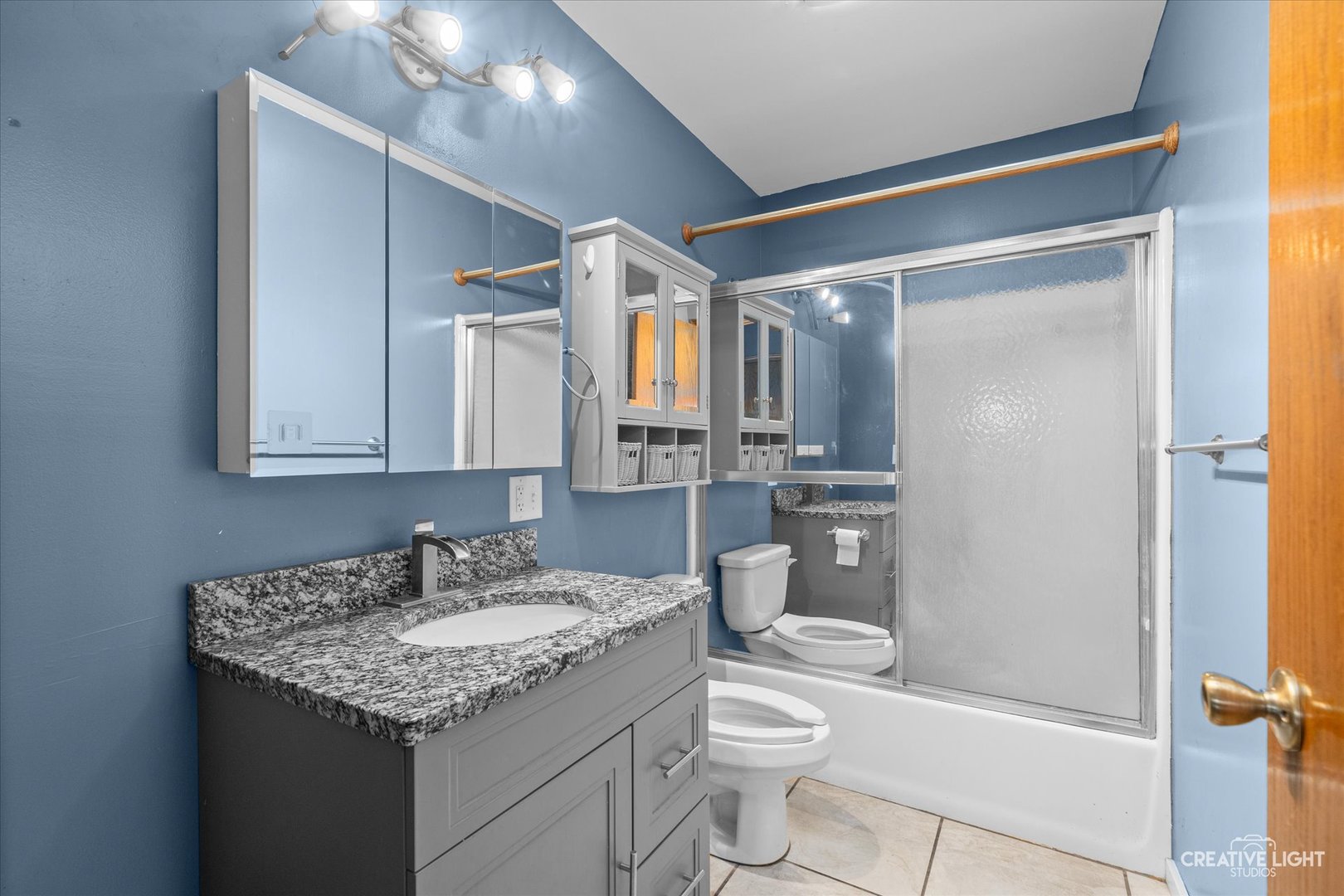 110 Windward Lane Rochelle, IL 61068 - Photo 8 of 23 a bathroom with a granite countertop sink toilet and shower