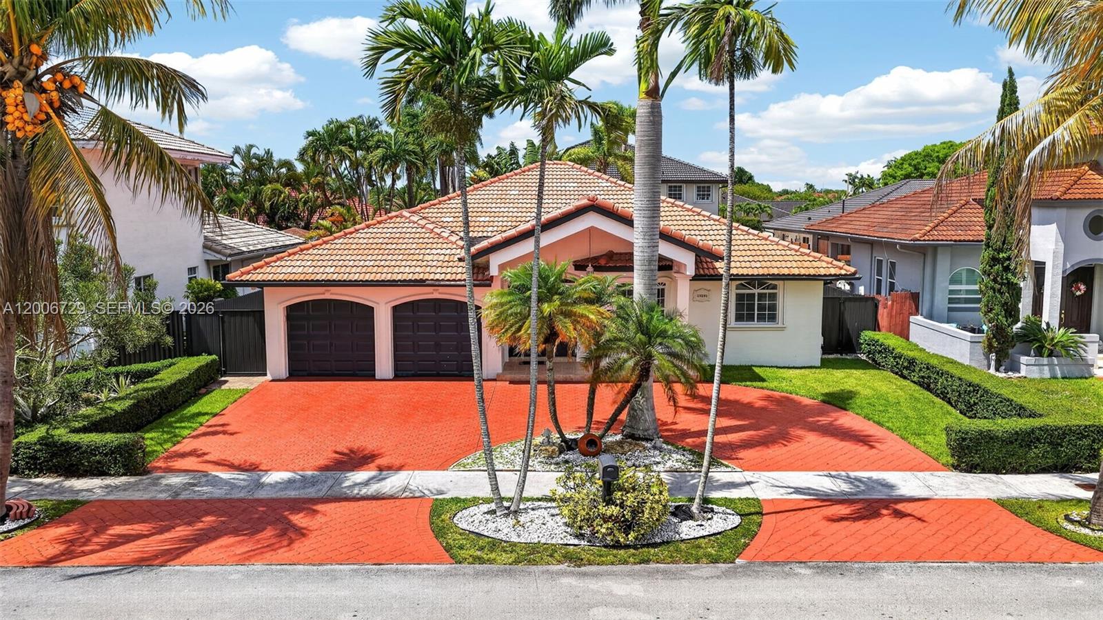 14251 Southwest 34th Street Miami, FL 33175 - Photo 1 of 54 a front view of a house with a swimming pool