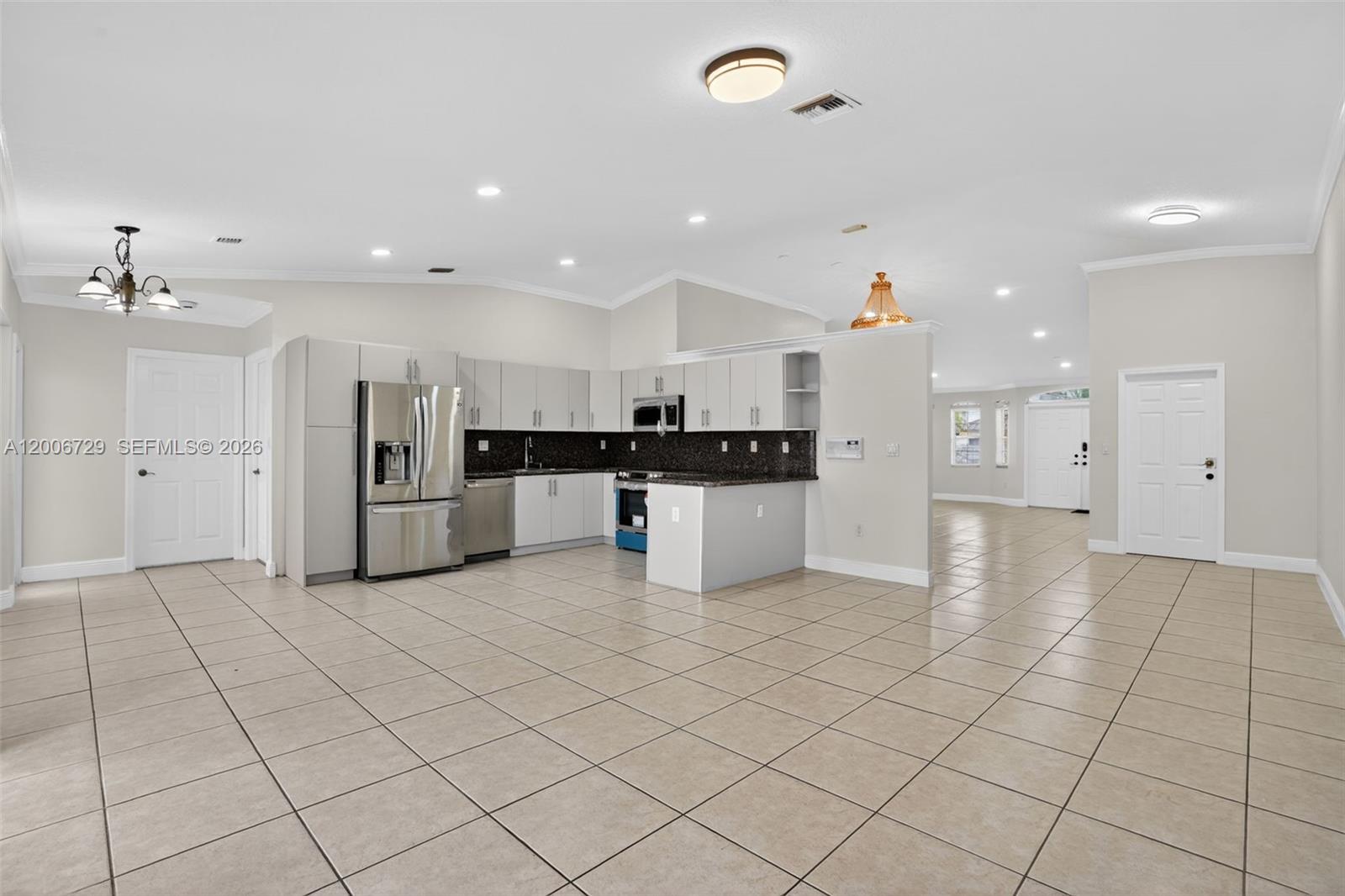 14251 Southwest 34th Street Miami, FL 33175 - Photo 14 of 54 a view of a kitchen with electric appliances