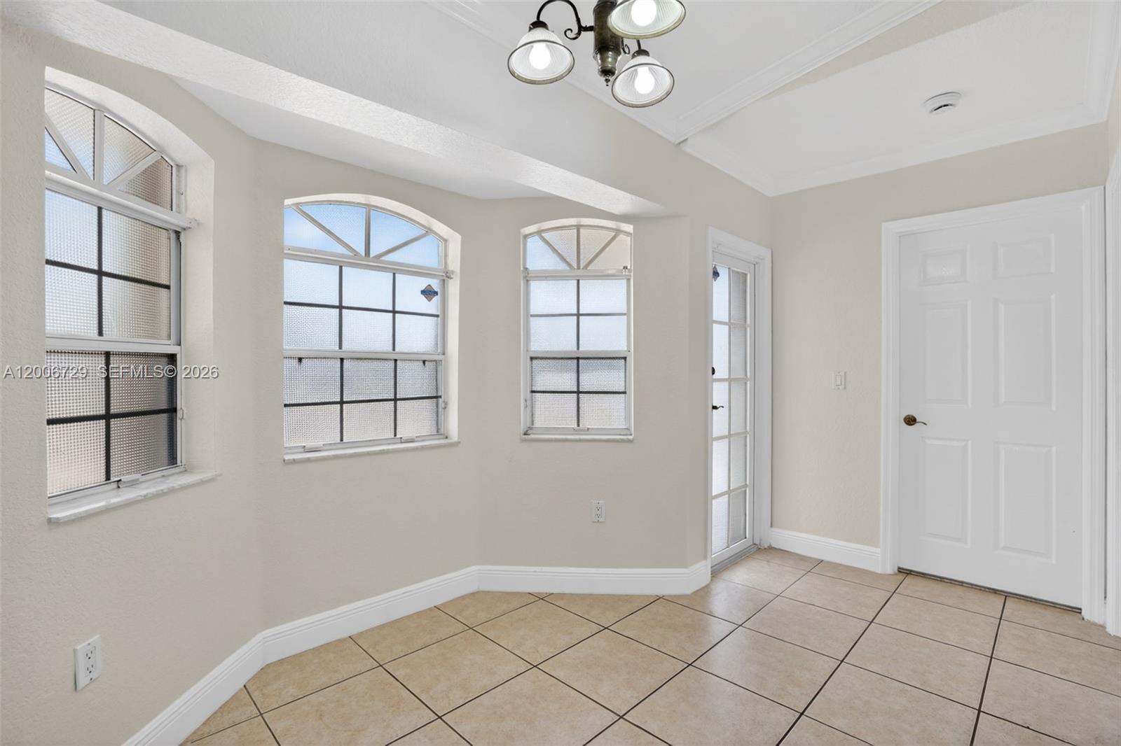 14251 Southwest 34th Street Miami, FL 33175 - Photo 18 of 54 a view of an empty room with a window