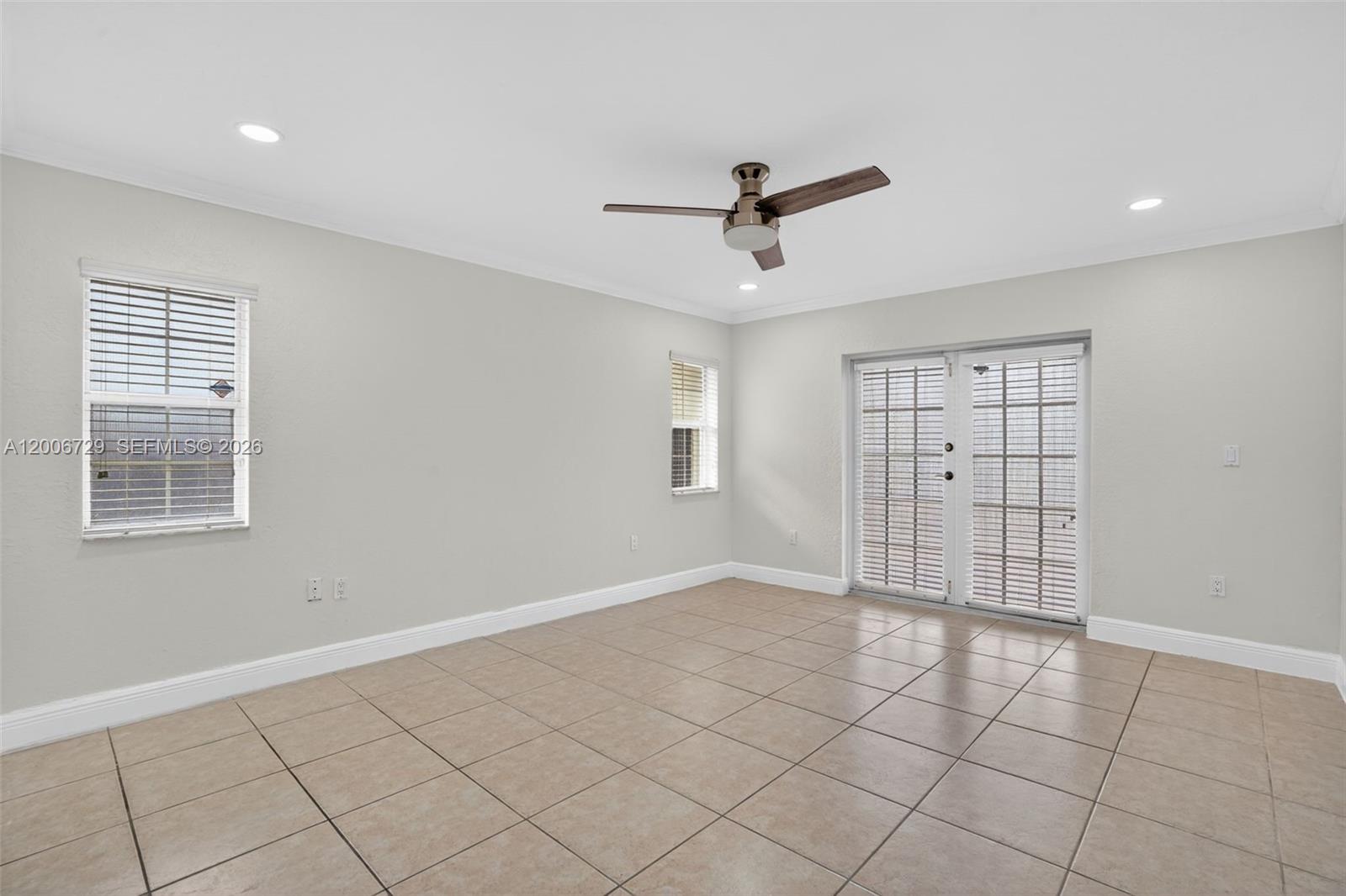 14251 Southwest 34th Street Miami, FL 33175 - Photo 24 of 54 a view of an empty room with a window